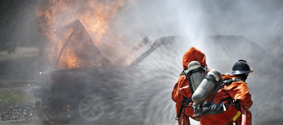 Firefighters fighting fire during training